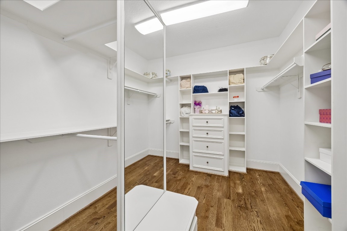 3711 Drake Street Houston, TX 77005 - Photo 17 of 34 Large primary closet with built-ins and room for storage.