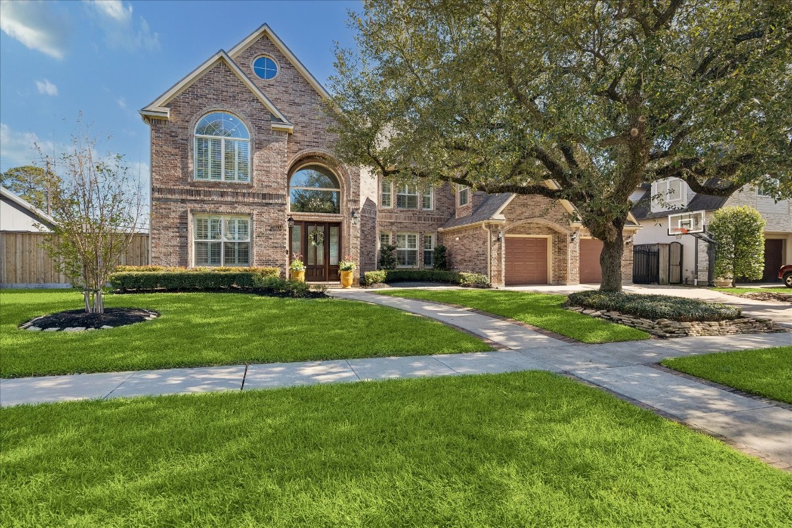 3711 Drake Street Houston, TX 77005 - Photo 2 of 34 Front entry with inviting walkway and mature tree.