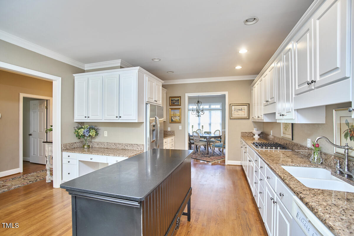 1344 Longleaf Drive Fayetteville, NC 28305 - Photo 11 of 46 a kitchen with stainless steel appliances granite countertop a sink stove and refrigerator