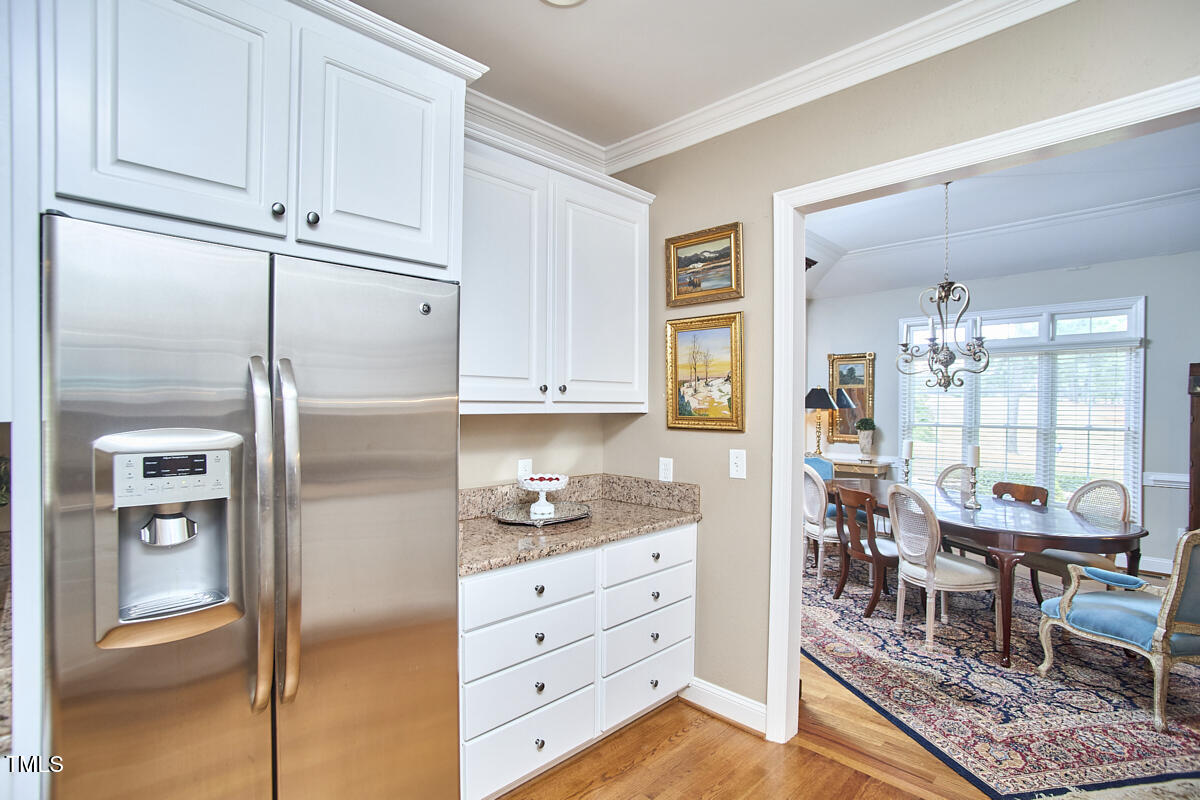 1344 Longleaf Drive Fayetteville, NC 28305 - Photo 14 of 46 a kitchen with stainless steel appliances granite countertop a refrigerator and cabinets