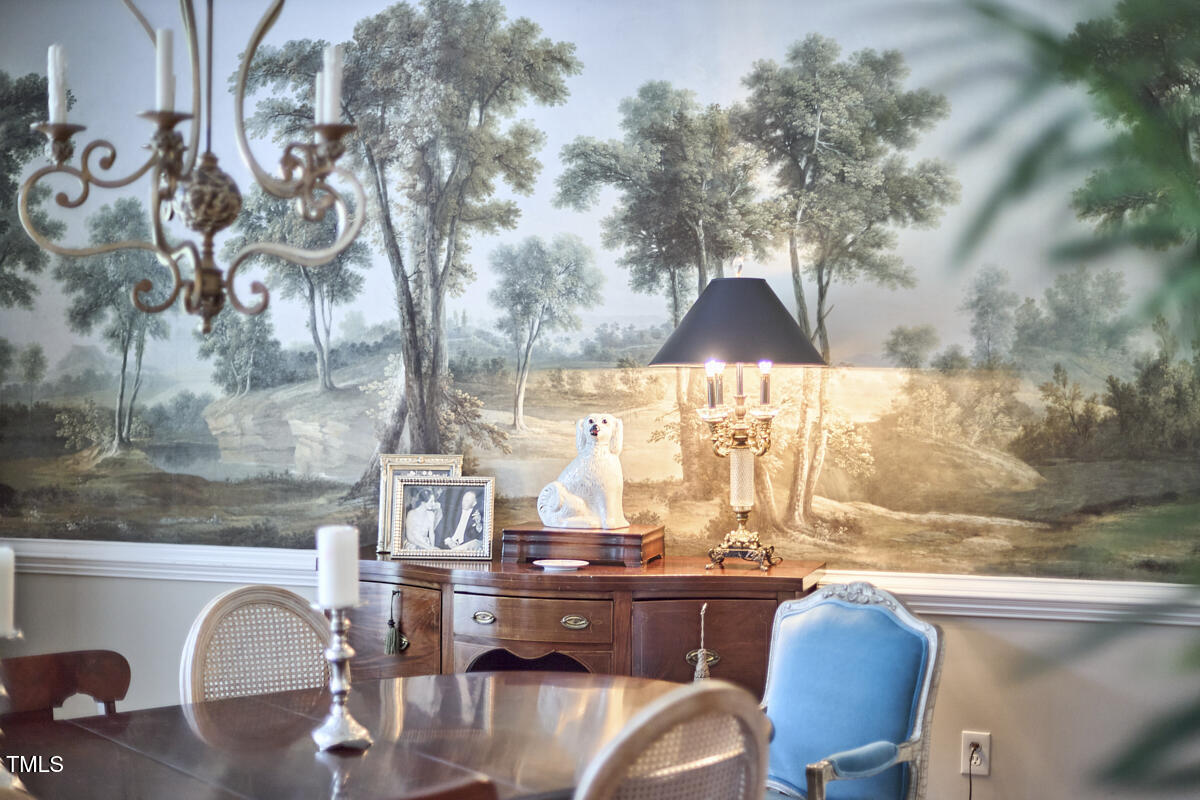 1344 Longleaf Drive Fayetteville, NC 28305 - Photo 18 of 46 a room with furniture and a chandelier