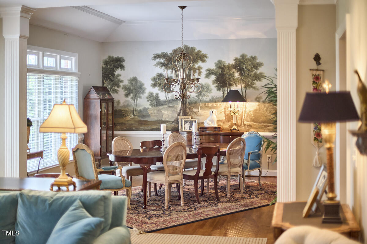 1344 Longleaf Drive Fayetteville, NC 28305 - Photo 19 of 46 a living room filled with furniture and a floor to ceiling window