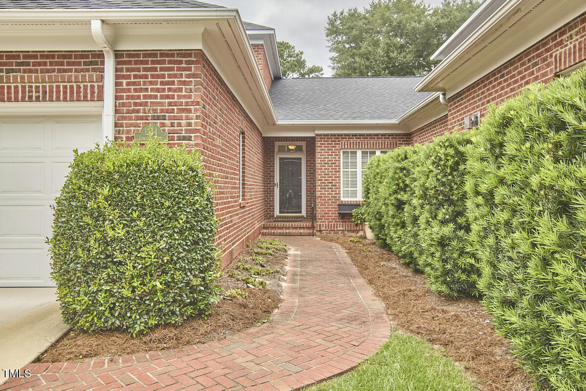 1344 Longleaf Drive Fayetteville, NC 28305 - Photo 2 of 46 a view of a garden with pathway
