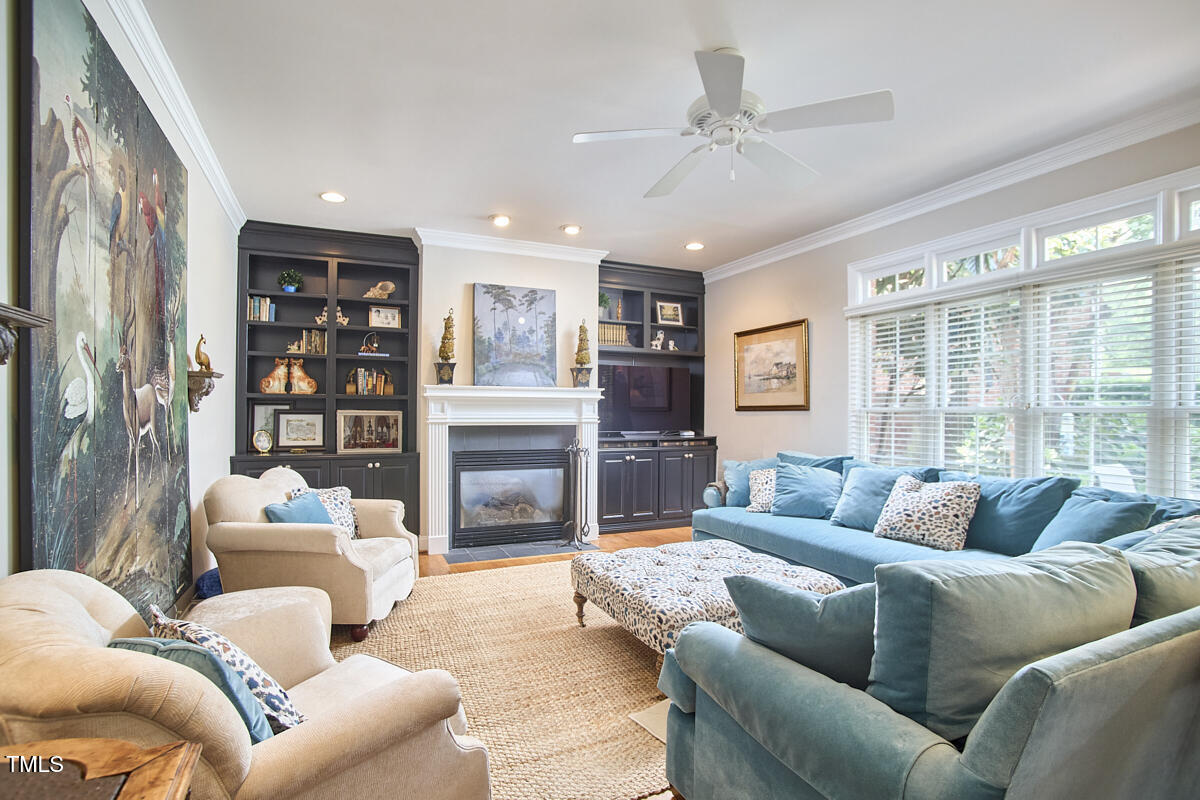 1344 Longleaf Drive Fayetteville, NC 28305 - Photo 21 of 46 a living room with furniture or couch and a fireplace