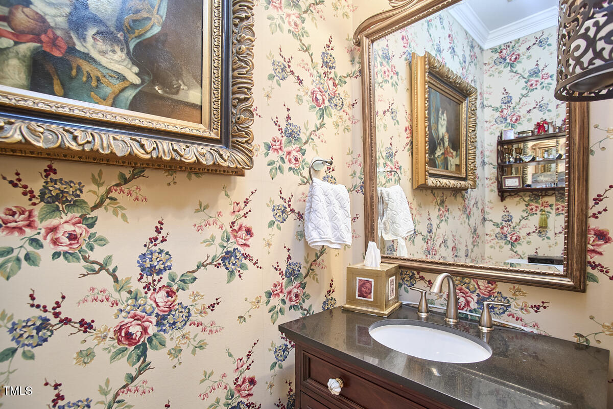 1344 Longleaf Drive Fayetteville, NC 28305 - Photo 27 of 46 a bathroom with a sink and a mirror