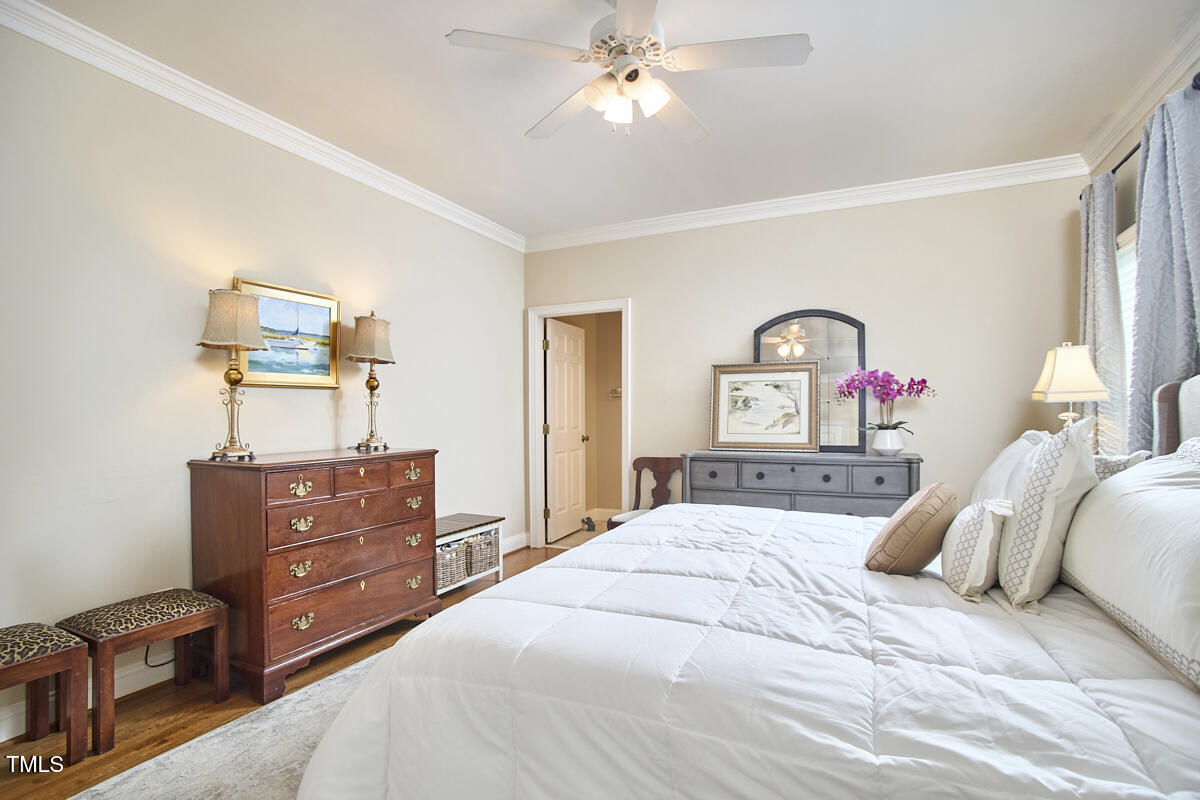 1344 Longleaf Drive Fayetteville, NC 28305 - Photo 31 of 46 a bedroom with a bed and a dresser