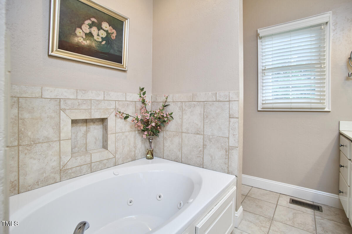 1344 Longleaf Drive Fayetteville, NC 28305 - Photo 32 of 46 a bathroom with a tub