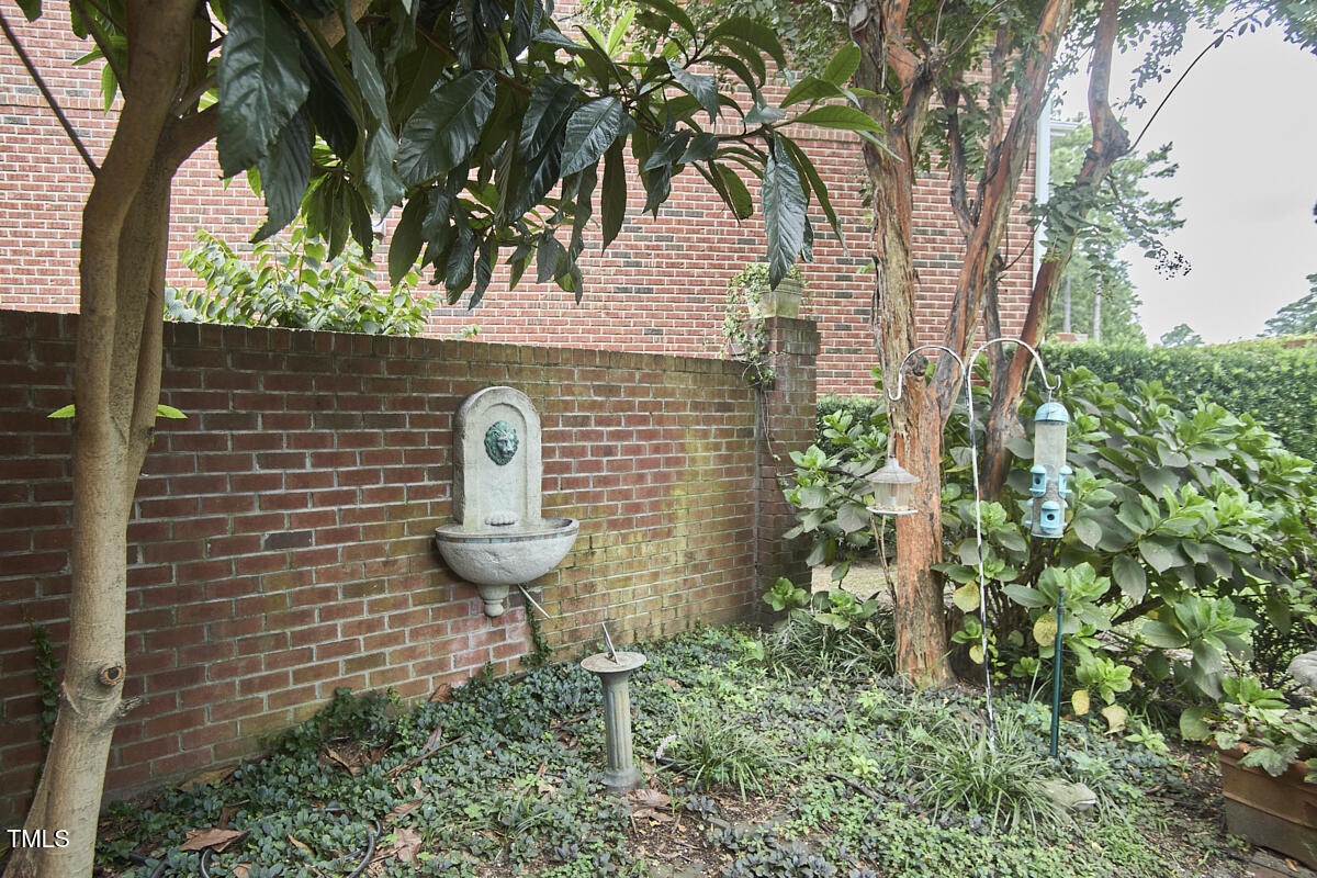 1344 Longleaf Drive Fayetteville, NC 28305 - Photo 42 of 46 a front view of a house with garden