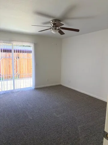 a view of a room that has a window in it