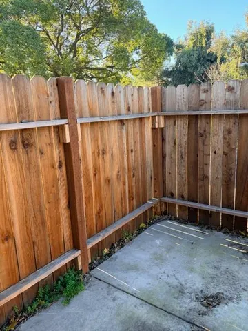 a view of wooden fence with wooden fence
