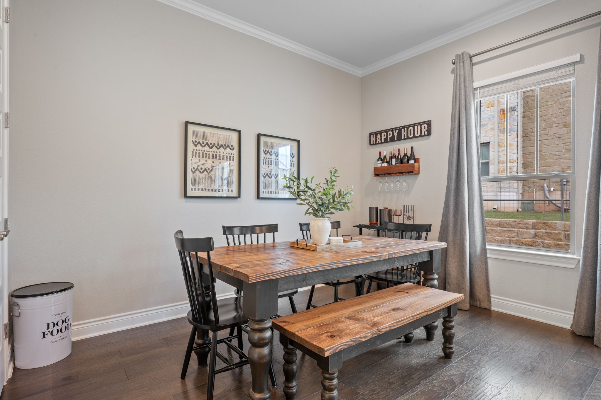 308 Adams Street Georgetown, TX 78628 - Photo 17 of 39 a view of a dining room with furniture and wooden floor