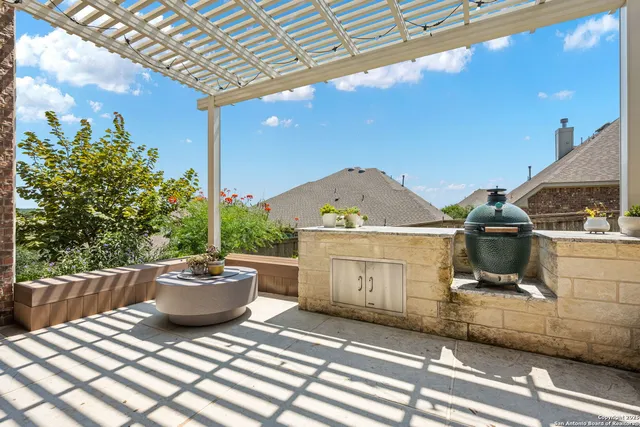 a view of a terrace with furniture