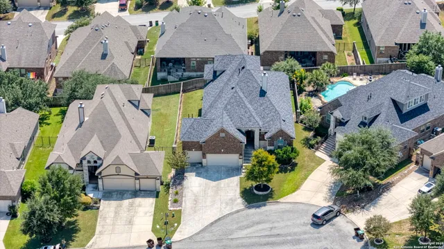 an aerial view of a city with lots of residential buildings