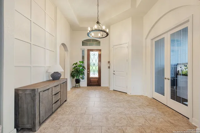 a view of an entryway with wooden floor