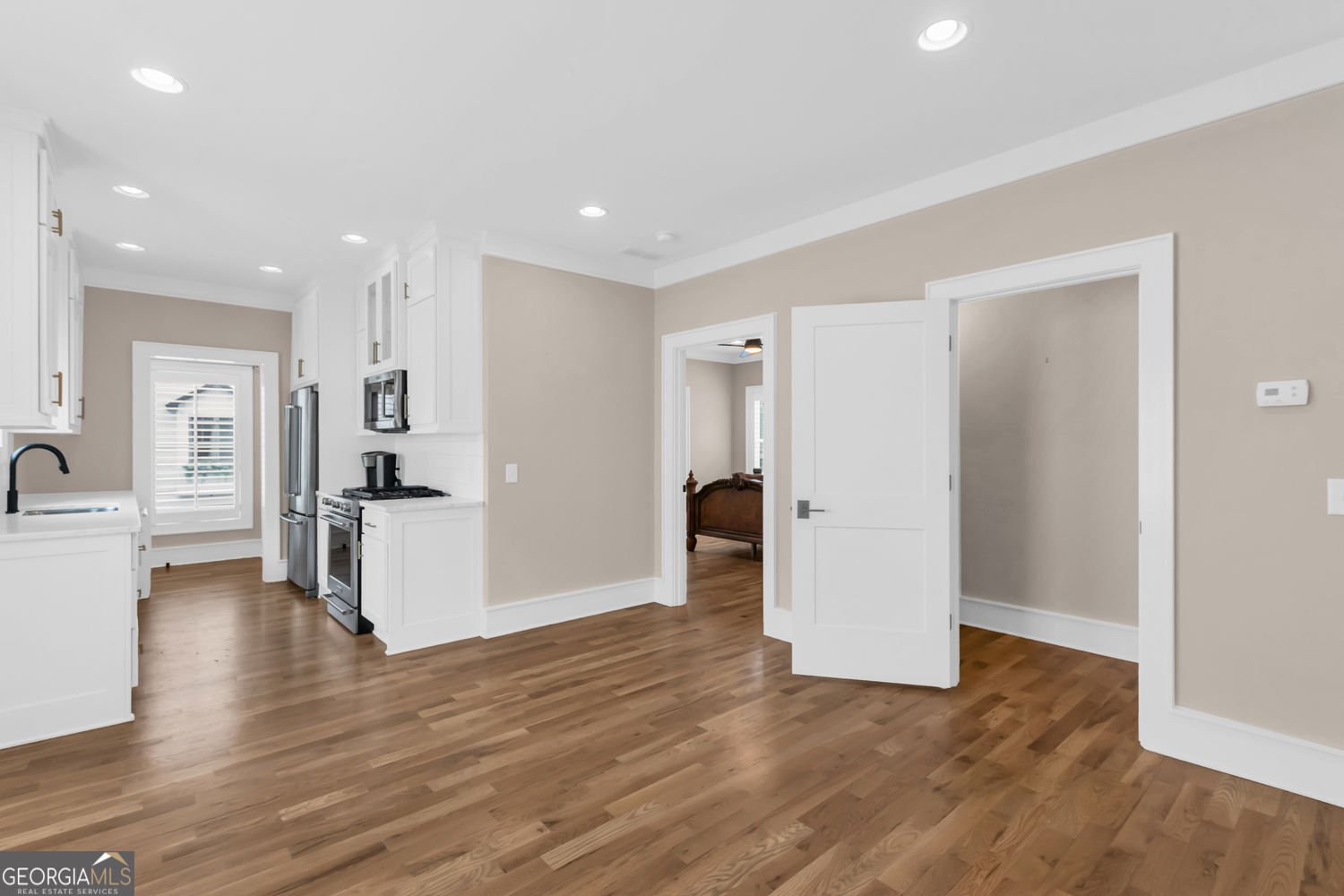 205 Flesner Court Clarkesville, GA 30523 - Photo 15 of 41 a view of a kitchen with furniture and wooden floor