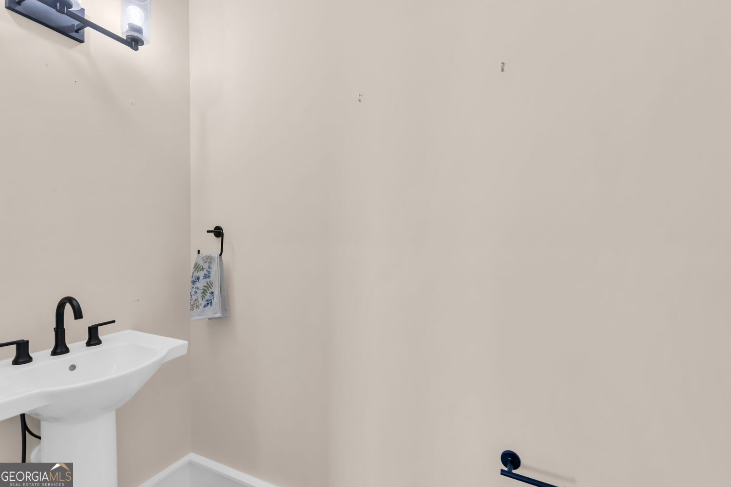 205 Flesner Court Clarkesville, GA 30523 - Photo 19 of 41 a bathroom with a sink a mirror and vanity