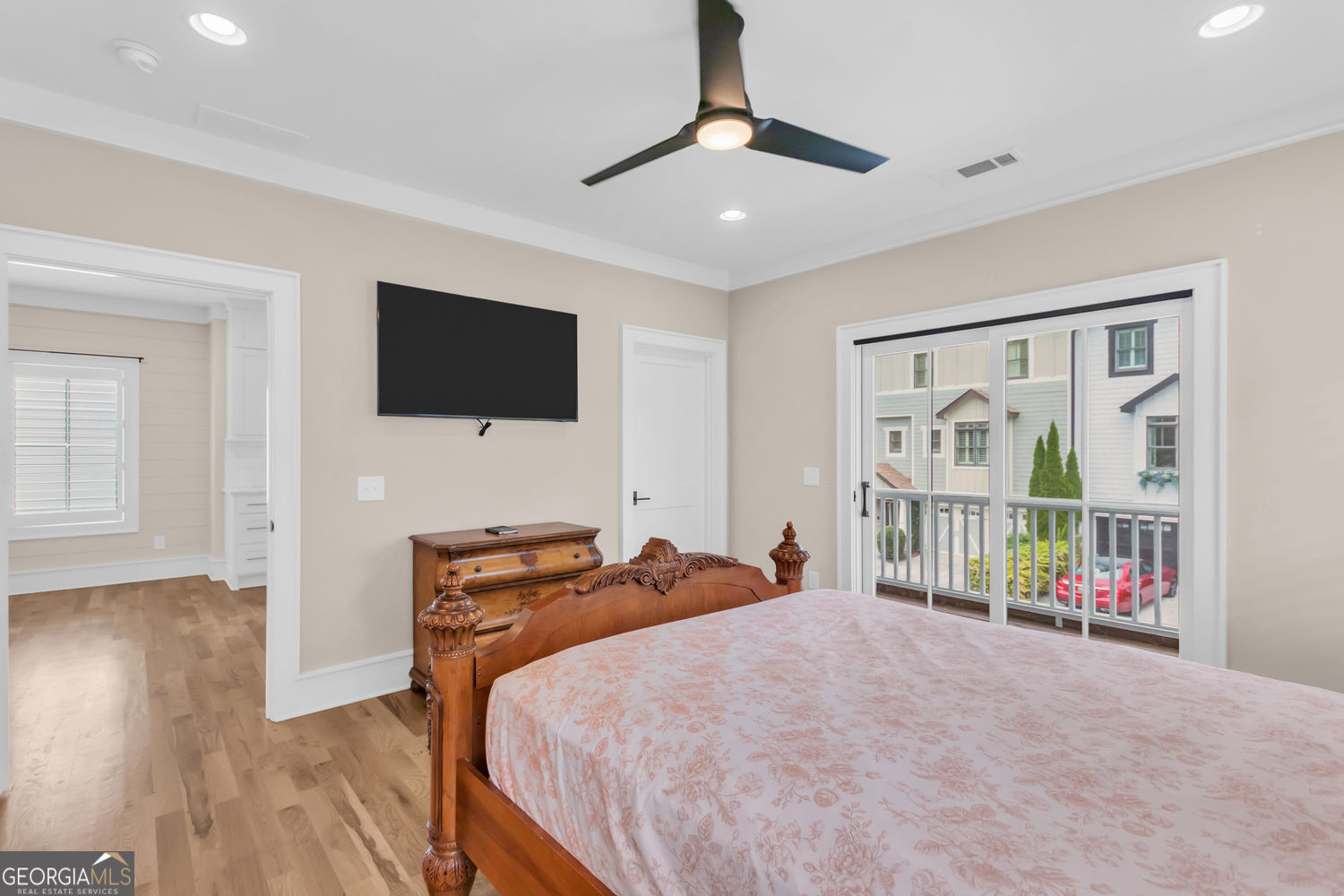 205 Flesner Court Clarkesville, GA 30523 - Photo 21 of 41 a bedroom with a bed and a flat screen tv