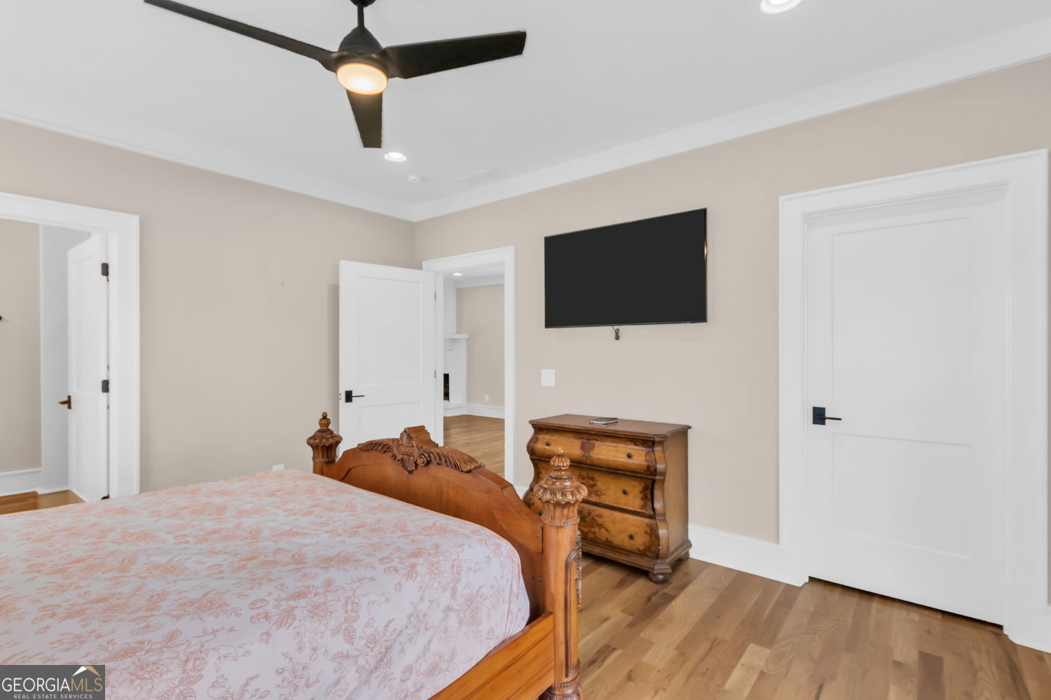 205 Flesner Court Clarkesville, GA 30523 - Photo 22 of 41 a bedroom with a bed and a flat screen tv
