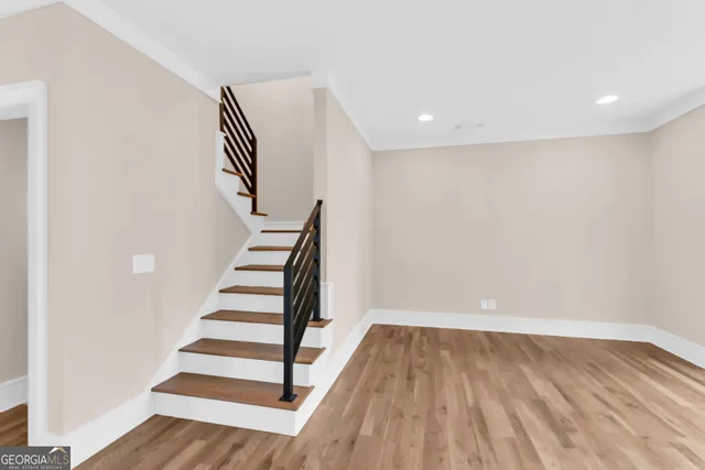 a view of entryway with wooden floor