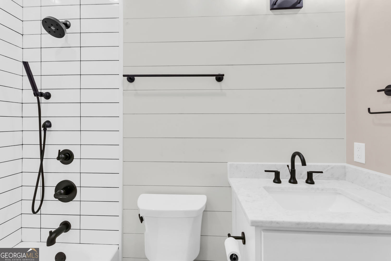 205 Flesner Court Clarkesville, GA 30523 - Photo 30 of 41 a bathroom with a sink a toilet and shower