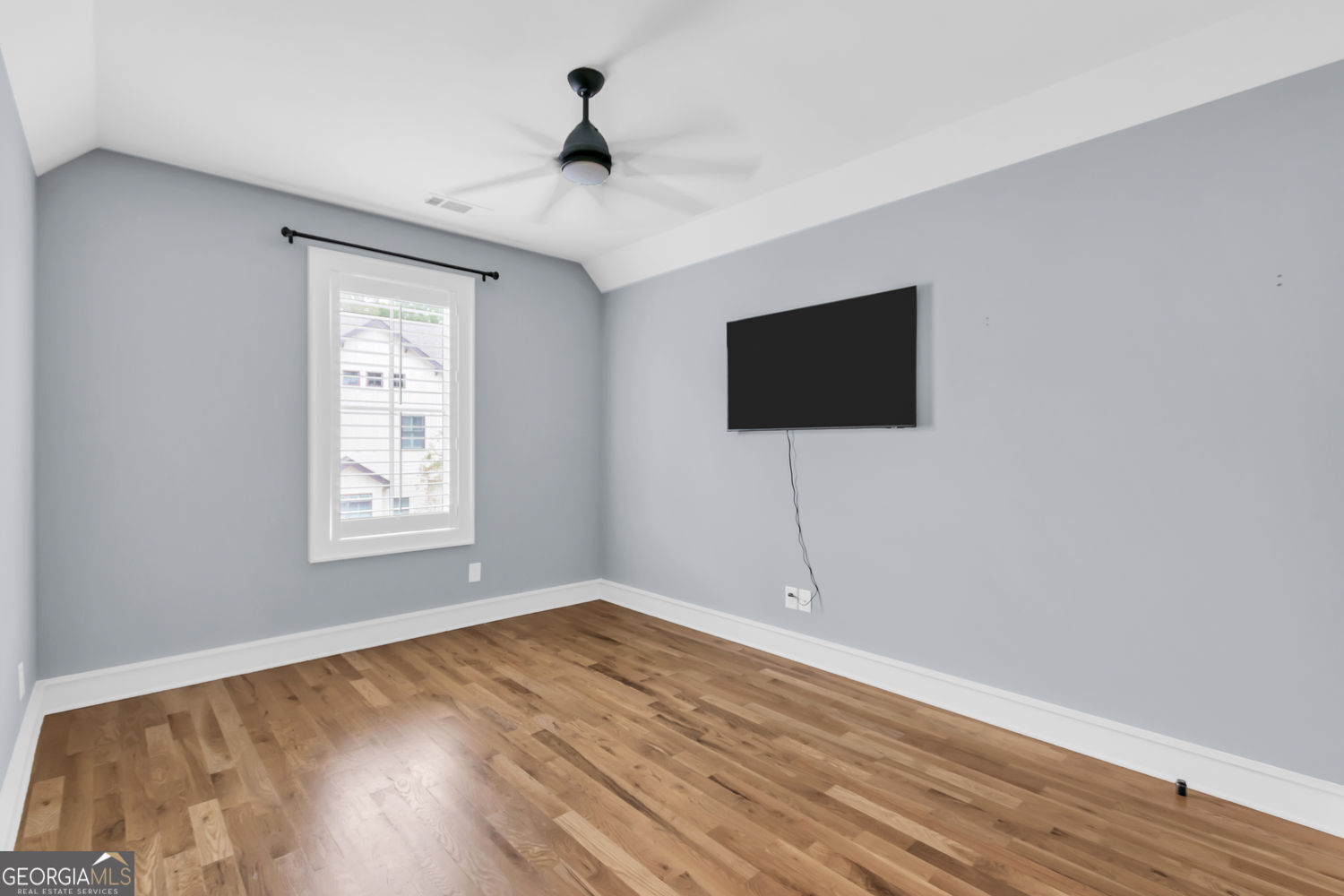 205 Flesner Court Clarkesville, GA 30523 - Photo 31 of 41 a view of a livingroom with wooden floor and a flat screen tv