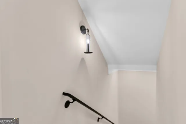 a view of a hallway with windows