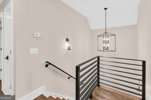 a view of a hallway with windows