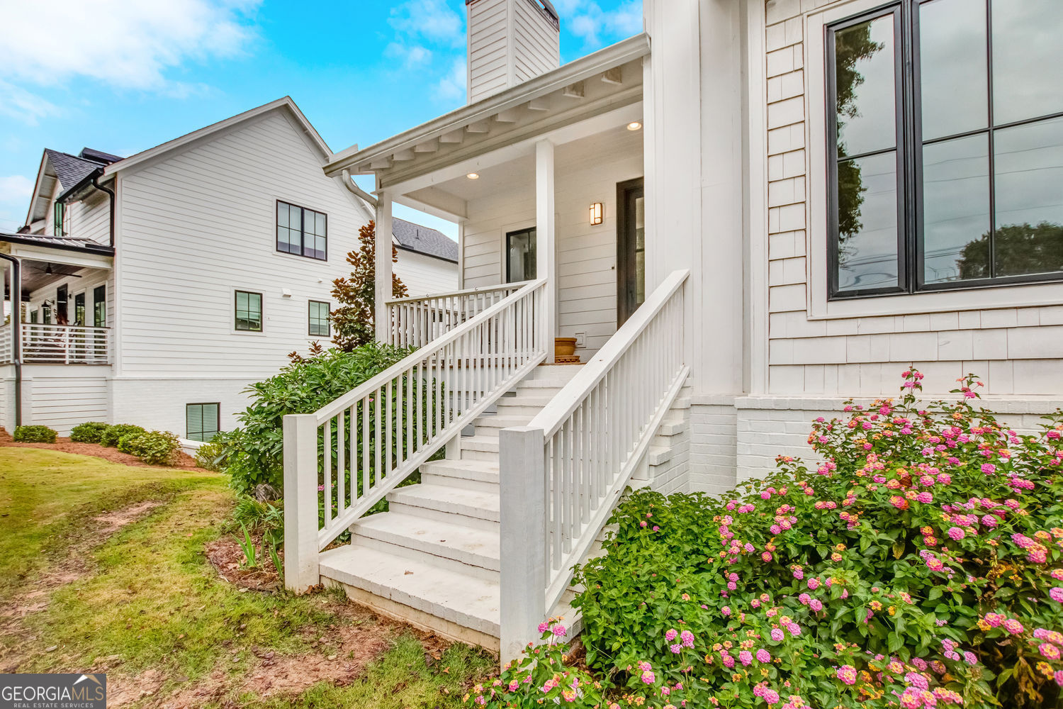 205 Flesner Court Clarkesville, GA 30523 - Photo 7 of 41 a view of a house with a flower garden