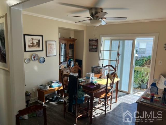 210 Washington Avenue Edison, NJ 08817 - Photo 4 of 5 a view of a dining room with furniture window and outside view