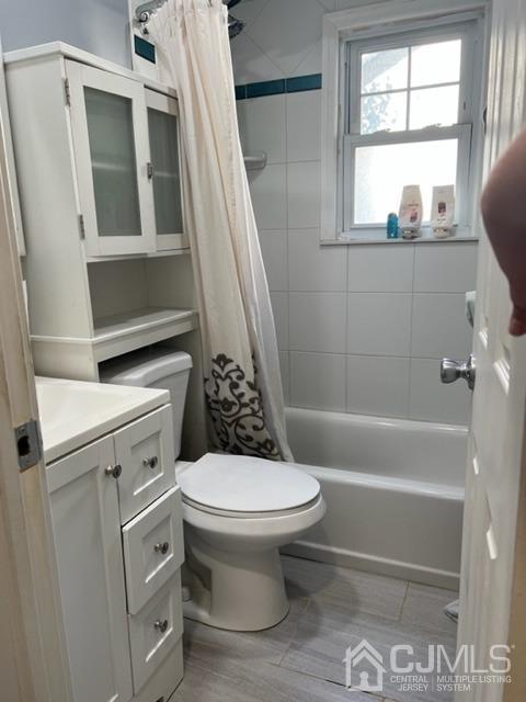 210 Washington Avenue Edison, NJ 08817 - Photo 5 of 5 a white toilet sitting next to a bath tub