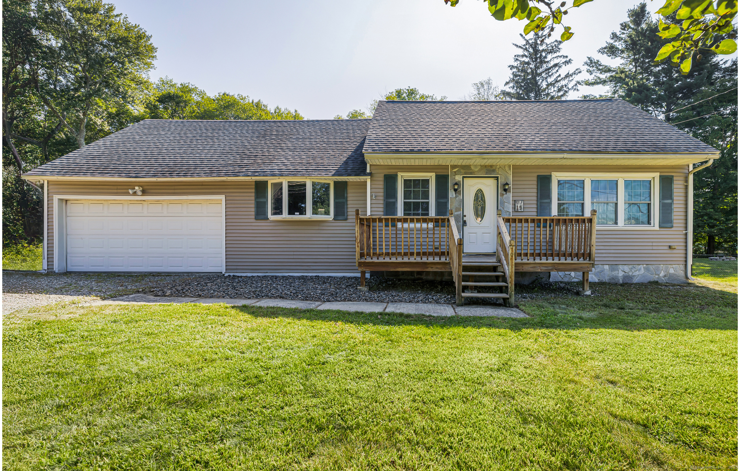 15 Todd Road Wolcott, CT 06716 - Photo 1 of 1 a view of a house with a yard potted plants and a large tree