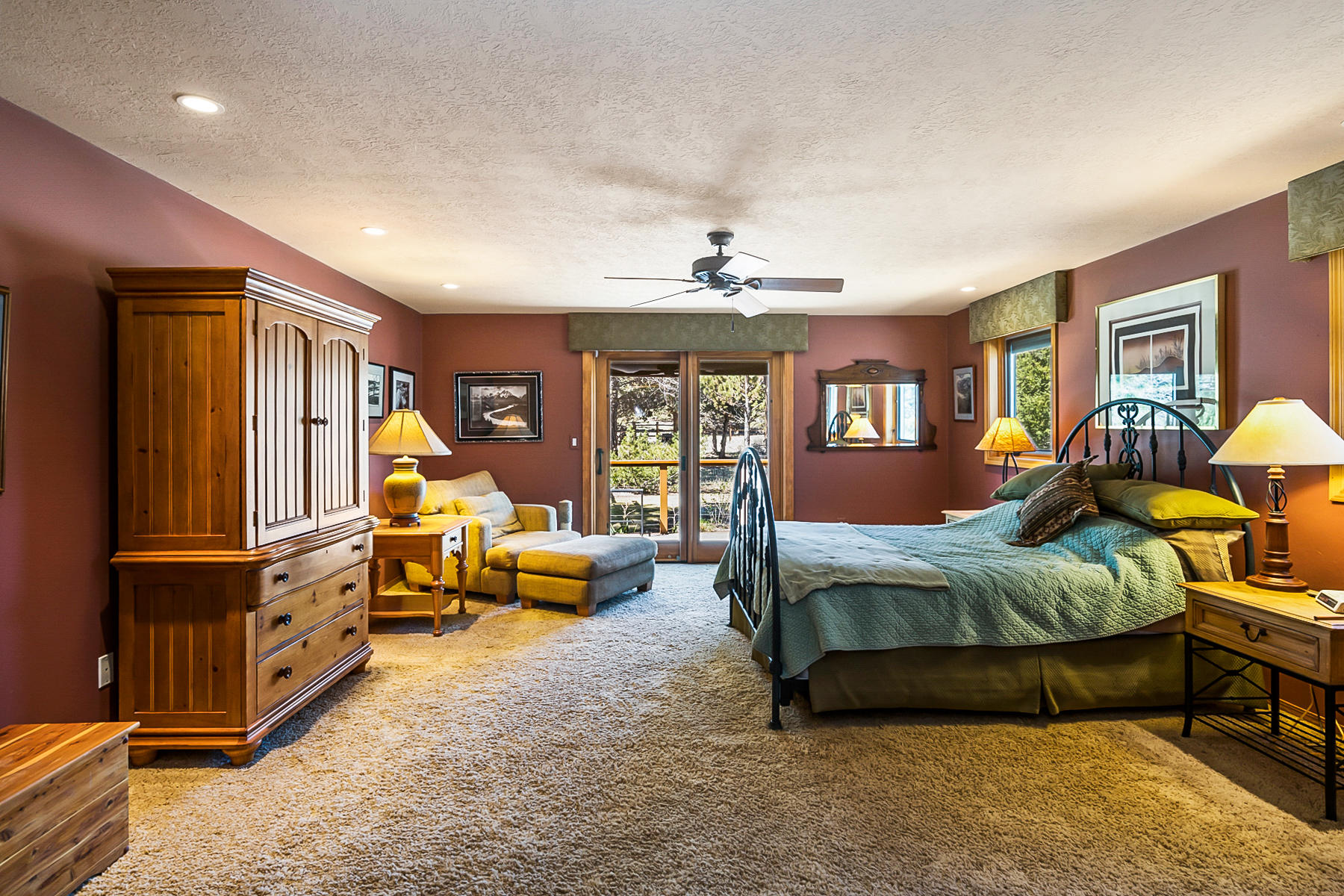64477 Joe Neil Road Bend, OR 97701 - Photo 18 of 39 a bedroom with bed and window