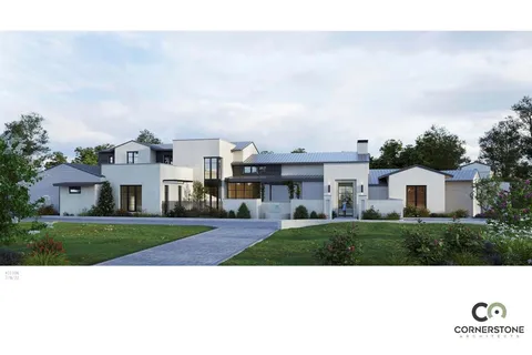 a black and white photo of a house