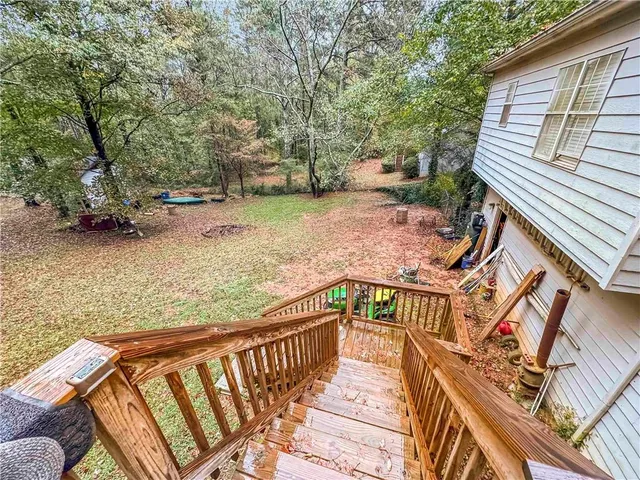 a view of a pathway with a patio