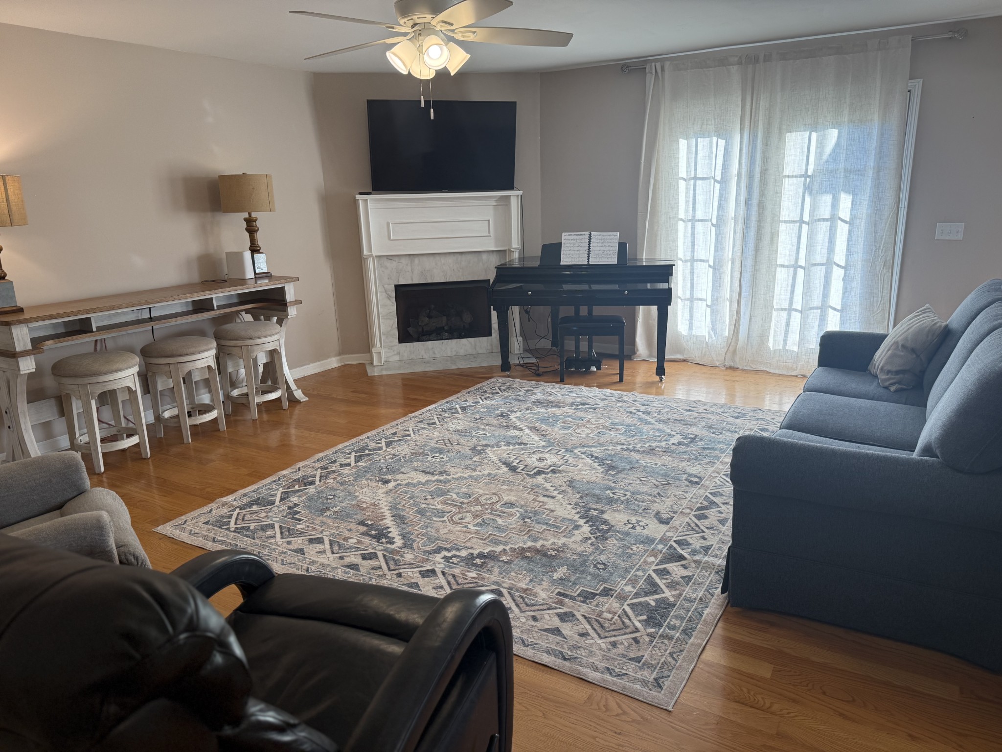 1702 Abiff Road Burns, TN 37029 - Photo 21 of 47 a living room with furniture and a fireplace