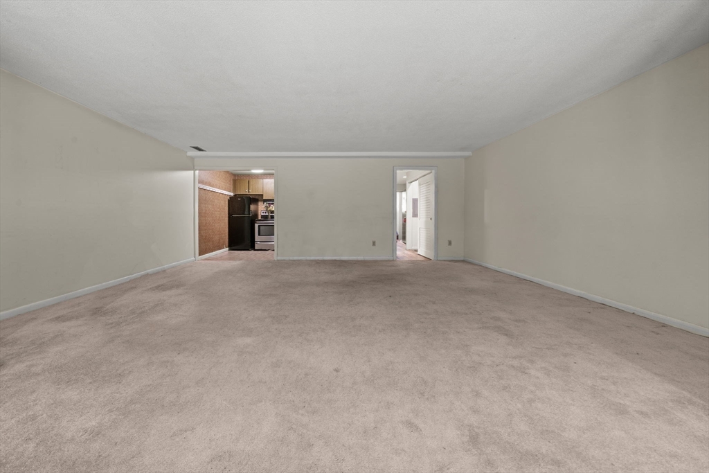 374 Great Road, Unit 11 Acton, MA 01720 - Photo 15 of 30 a view of empty room