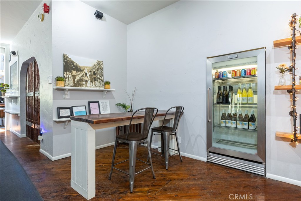 2720 Oak View Road Templeton, CA 93465 - Photo 32 of 75 Built-In Wine Fridge & Additional Seating Within the Bar Tasting Room