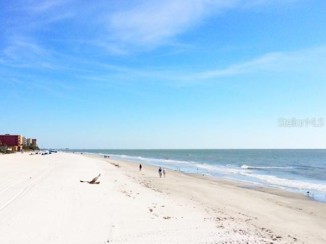 10764 70th Avenue, Unit 1102 Seminole, FL 33772 - Photo 24 of 25 a view of beach and ocean