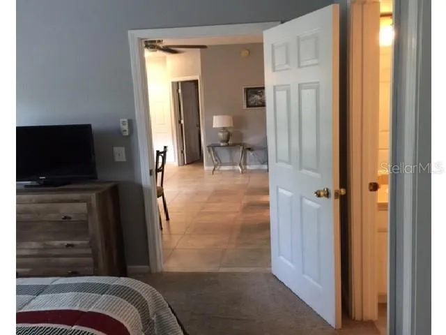 a view of a bedroom from hallway