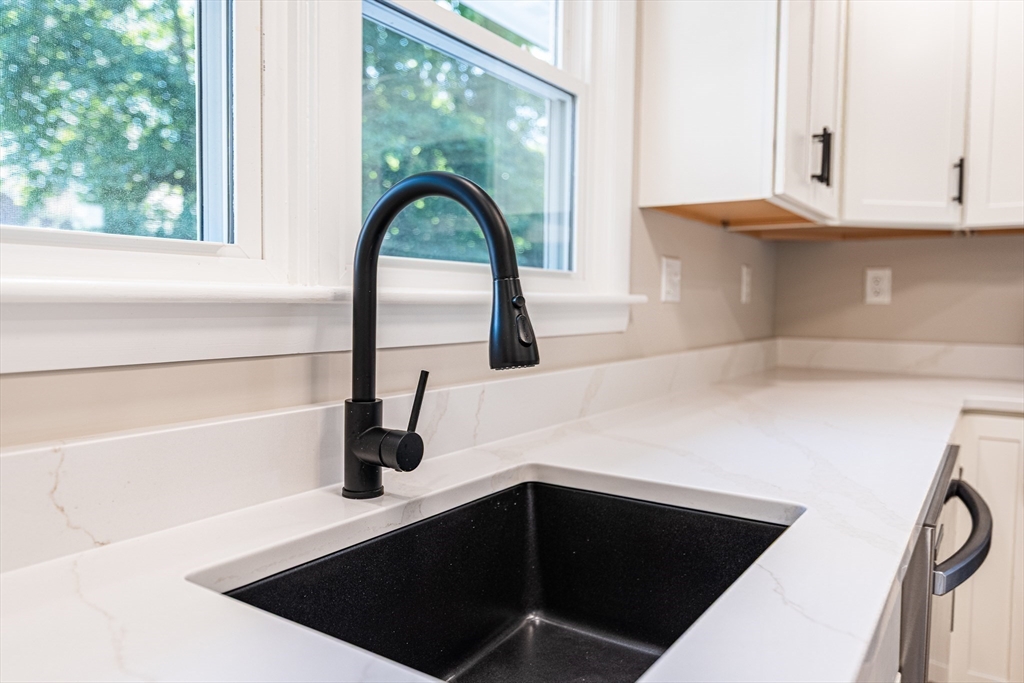 17 Hamlet Street Fairhaven, MA 02719 - Photo 16 of 40 a kitchen with a sink and a window