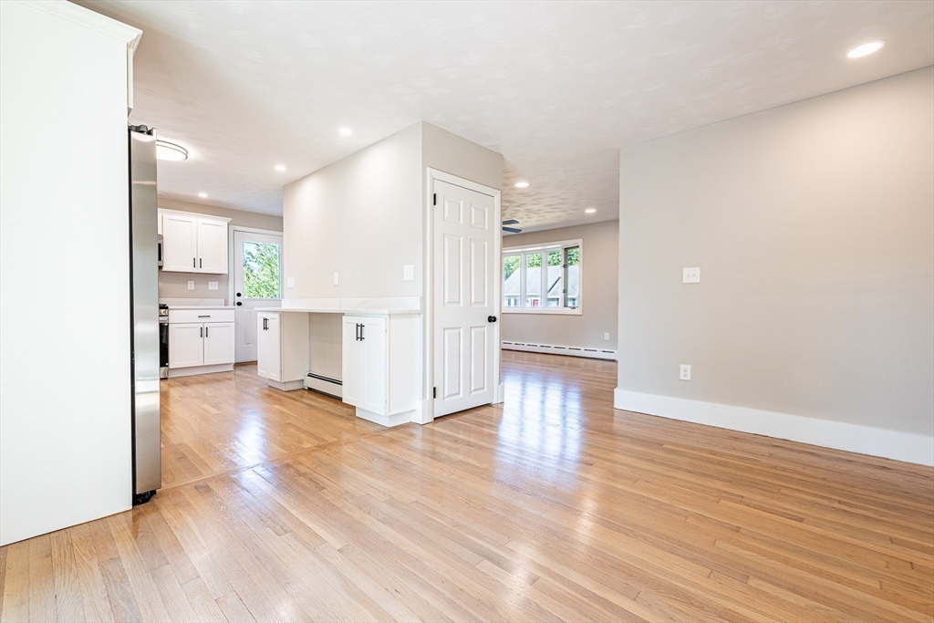 17 Hamlet Street Fairhaven, MA 02719 - Photo 20 of 40 a view of a kitchen with wooden floor and a window