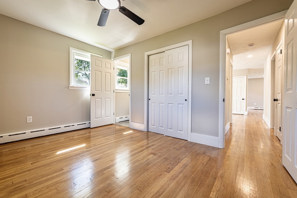 17 Hamlet Street Fairhaven, MA 02719 - Photo 26 of 40 wooden floor in an empty room with a window
