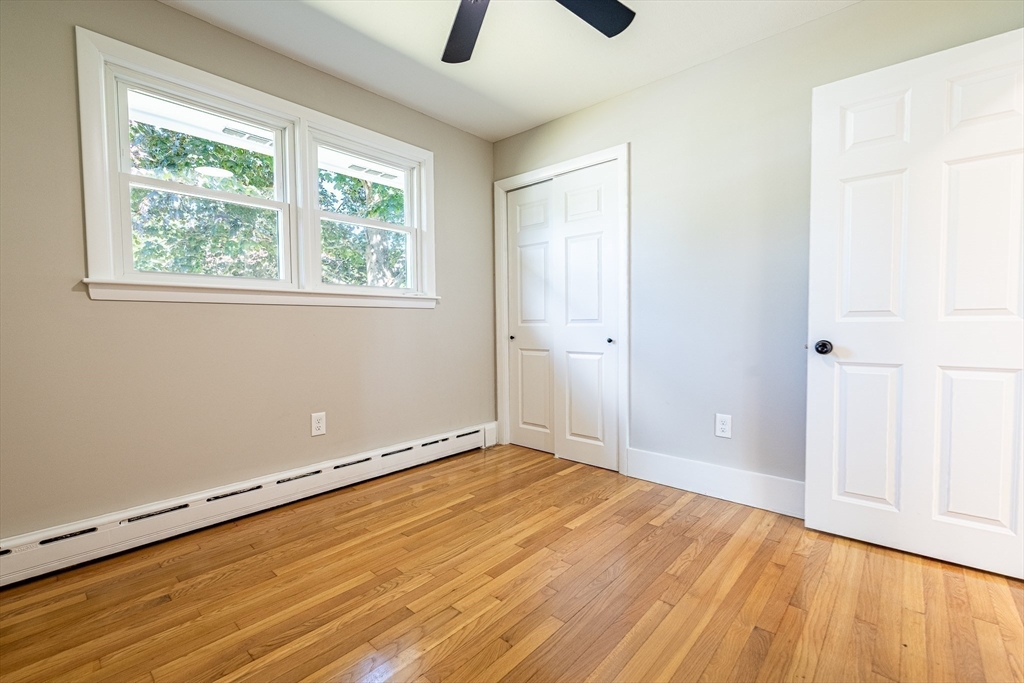 17 Hamlet Street Fairhaven, MA 02719 - Photo 31 of 40 wooden floor in an empty room with a window
