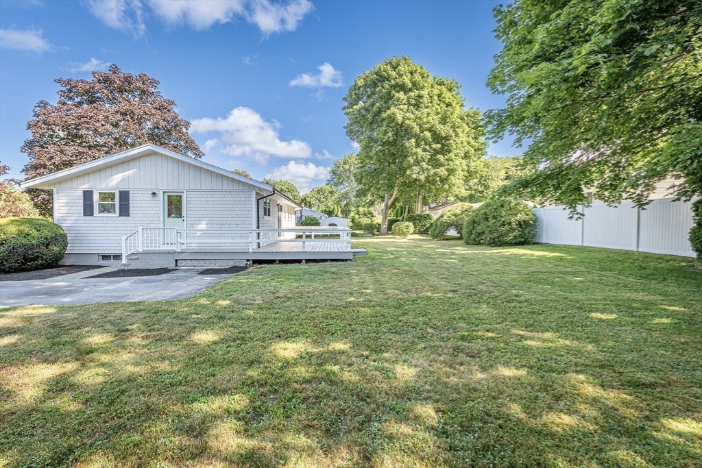 17 Hamlet Street Fairhaven, MA 02719 - Photo 36 of 40 a view of a house with a yard porch and sitting area