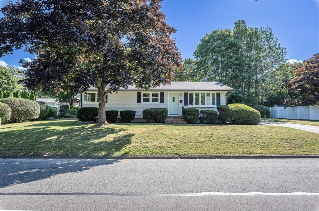 17 Hamlet Street Fairhaven, MA 02719 - Photo 5 of 40 a front view of a house with garden
