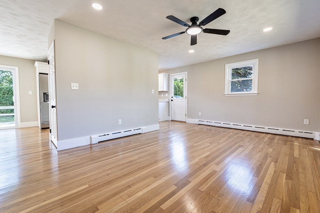 17 Hamlet Street Fairhaven, MA 02719 - Photo 8 of 40 an empty room with wooden floor and windows