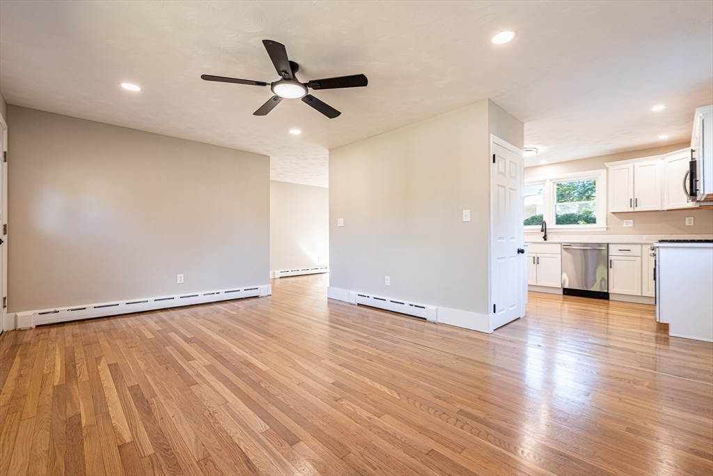 17 Hamlet Street Fairhaven, MA 02719 - Photo 9 of 40 a view of an empty room and wooden floor
