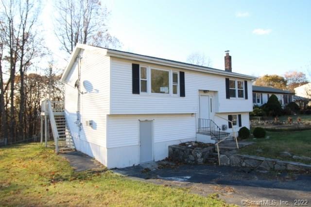 89 Fieldwood Road Waterbury, CT 06704 - Photo 1 of 1 a view of a house with backyard and plants