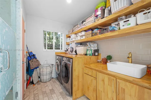 a utility room with dryer and washer