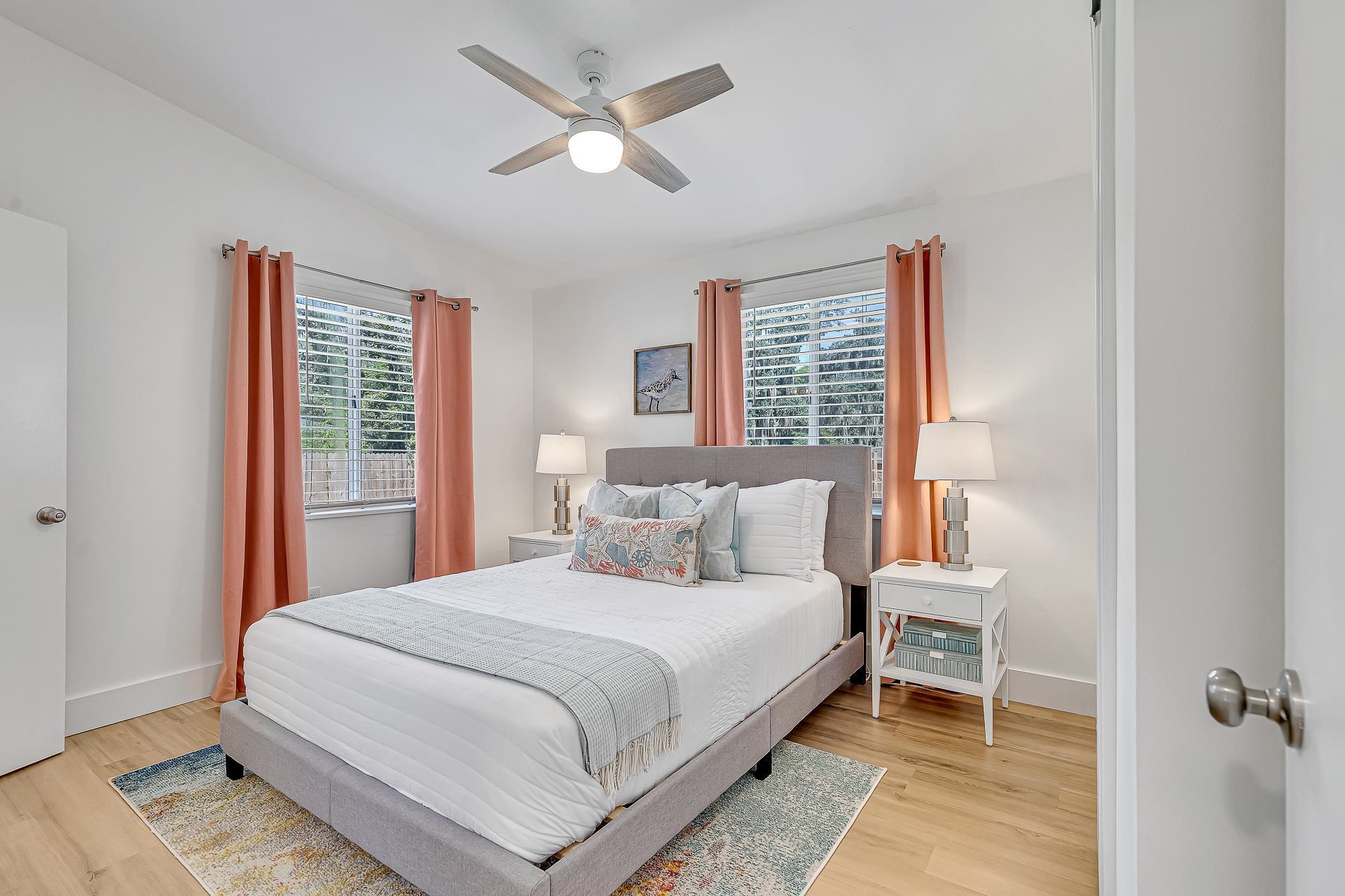 110 Terrapin Road St. Augustine, FL 32086 - Photo 13 of 46 a bedroom with a large bed and a window